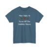Unisex t-shirt from Twisted Angell with the sarcastic phrase “Most Likely To Turn Off The Holiday Music” printed on the front.