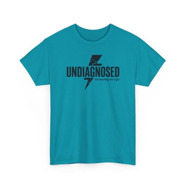 11500072468511562887_2048.jpeg Unisex t-shirt from Twisted Angell with the sarcastic phrase “Undiagnosed, But Something Ain't Right” printed on the front.