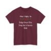 Unisex t-shirt from Twisted Angell with the sarcastic phrase “Most Likely To Trip Over The Dog In A Santa Hat” printed on the front.