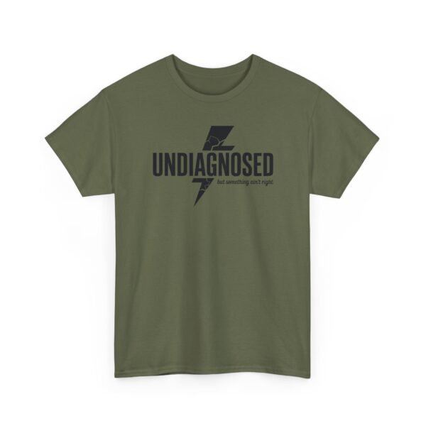 14278588186799352345_2048.jpeg Unisex t-shirt from Twisted Angell with the sarcastic phrase “Undiagnosed, But Something Ain't Right” printed on the front.