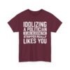 Unisex t-shirt from Twisted Angell with the sarcastic phrase “Idolizing A Politician Is Like Believing The Stripper Really Likes You” printed on the front.