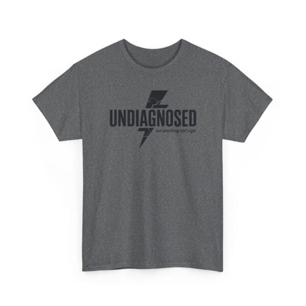 16089421804319173264_2048.jpeg Unisex t-shirt from Twisted Angell with the sarcastic phrase “Undiagnosed, But Something Ain't Right” printed on the front.