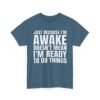 Unisex t-shirt from Twisted Angell with the sarcastic phrase “Just Because I'm Awake Doesn't Mean I'm Ready To Do Things” printed on the front.