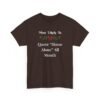 Unisex t-shirt from Twisted Angell with the sarcastic phrase “Most Likely to Quote "Home Alone" All Month” printed on the front.