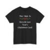 Unisex t-shirt from Twisted Angell with the sarcastic phrase “Most Likely To Recycle Last Year's Christmas Card” printed on the front.