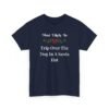 Unisex t-shirt from Twisted Angell with the sarcastic phrase “Most Likely To Trip Over The Dog In A Santa Hat” printed on the front.