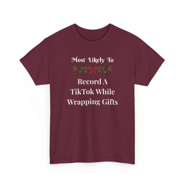 Unisex t-shirt from Twisted Angell with the sarcastic phrase “Most Likely To Record A TikTok While Wrapping Gifts” printed on the front.