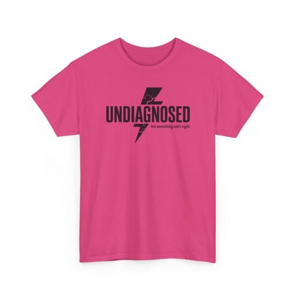 2322741284848732557_2048.jpeg Unisex t-shirt from Twisted Angell with the sarcastic phrase “Undiagnosed, But Something Ain't Right” printed on the front.