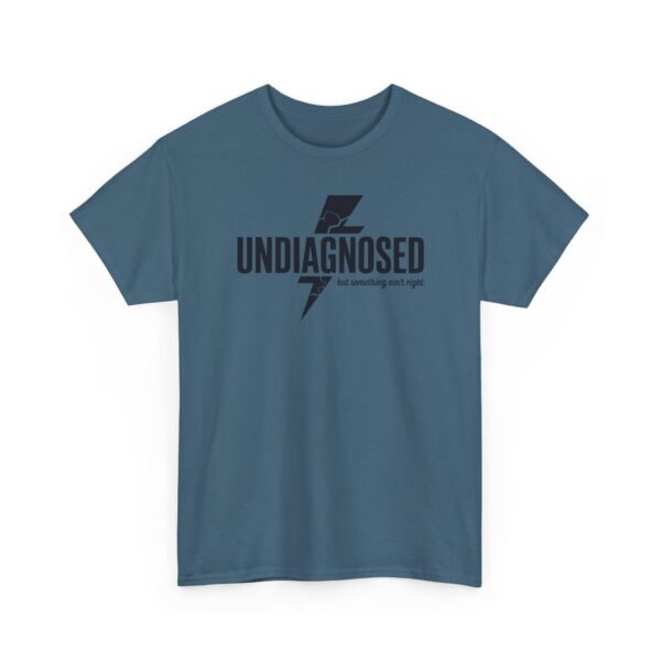 3545157142677435393_2048.jpeg Unisex t-shirt from Twisted Angell with the sarcastic phrase “Undiagnosed, But Something Ain't Right” printed on the front.