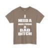 Unisex t-shirt from Twisted Angell with the sarcastic phrase “I Need a Hug from a Bad Bitch” printed on the front.