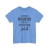 Unisex t-shirt from Twisted Angell with the sarcastic phrase “Cleverly Disguised As A Responsible Adult” printed on the front.