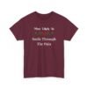 Unisex t-shirt from Twisted Angell with the sarcastic phrase “Most Likely To Smile Through The Pain” printed on the front.