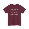 Unisex t-shirt from Twisted Angell with the sarcastic phrase “Most Likely To Buy Gifts They Can't Afford” printed on the front.
