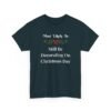 Unisex t-shirt from Twisted Angell with the sarcastic phrase “Most Likely To Still Be Decorating On Christmas Day” printed on the front.