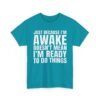 Unisex t-shirt from Twisted Angell with the sarcastic phrase “Just Because I'm Awake Doesn't Mean I'm Ready To Do Things” printed on the front.