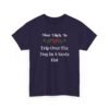 Unisex t-shirt from Twisted Angell with the sarcastic phrase “Most Likely To Trip Over The Dog In A Santa Hat” printed on the front.