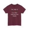 Unisex t-shirt from Twisted Angell with the sarcastic phrase “Most Likely To Lose Their Santa Hat And Dignity” printed on the front.