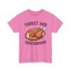 Unisex t-shirt from Twisted Angell with the sarcastic phrase “Turkey and Touchdowns” printed on the front.