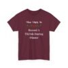 Unisex t-shirt from Twisted Angell with the sarcastic phrase “Most Likely To Record A TikTok During Dinner” printed on the front.