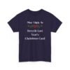 Unisex t-shirt from Twisted Angell with the sarcastic phrase “Most Likely To Recycle Last Year's Christmas Card” printed on the front.