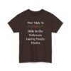 Unisex t-shirt from Twisted Angell with the sarcastic phrase “Most Likely To Hide In The Bathroom During Family Photos” printed on the front.