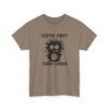 Unisex t-shirt from Twisted Angell with the sarcastic phrase “Coffee First Then Chaos” printed on the front.