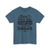Unisex t-shirt from Twisted Angell with the sarcastic phrase “Don't Make Me Assign You Extra Homework” printed on the front.