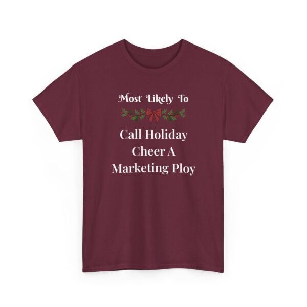 8120589617206194105_2048.jpeg Unisex t-shirt from Twisted Angell with the sarcastic phrase “Most Likely To Call Holiday Cheer A Marketing Ploy” printed on the front.
