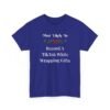 Unisex t-shirt from Twisted Angell with the sarcastic phrase “Most Likely To Record A TikTok While Wrapping Gifts” printed on the front.