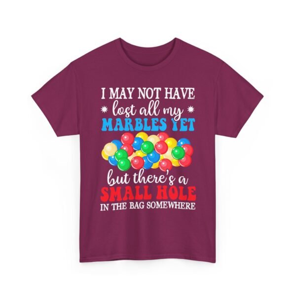 Unisex t-shirt from Twisted Angell with the sarcastic phrase “I May Not Have Lost All My Marbles Yet, But There's A Small Hole In The Bag Somewhere” printed on the front.